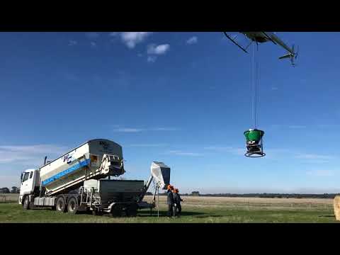 Ground-Effect Spreading Bucket hard at work prepping for winter