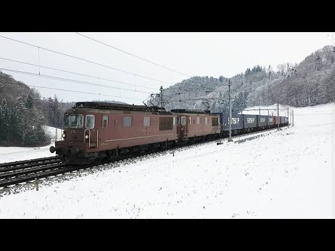 Trafic ferroviaire à Wynigen avec neige/Bahnverkehr in Wynigen mit Schnee
