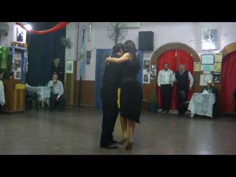  Emiliano Pilloni  and  Pamela Natalia Mármol  are  dancing  to  the  milonga  "  Cacareando  "