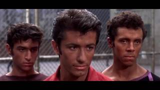 The Gangs fight in the street (West Side Story)