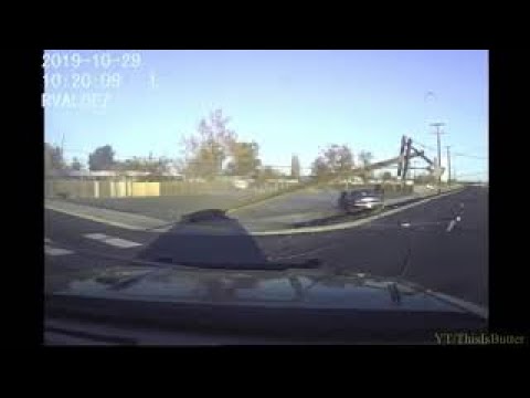 Police dashcam from 2019 shows driver crashes into a power pole