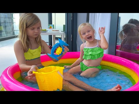 SOFIA AND NIKA AND THE NEW POOL ON THE BALLOON