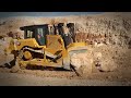 Cat D7 Dozer Takes on Some Big Rocks