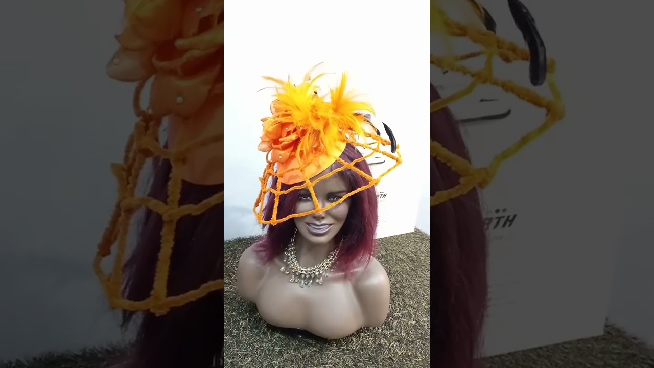 Watch video Orange Cobweb Fascinator for Weddings in Lagos Nigeria Now Orange Cobweb Fascinator for Weddings in Lagos Nigeria
