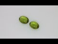 Coppia di Peridoti, taglio ovale cabochon, 3.14 ct tot. Video 1