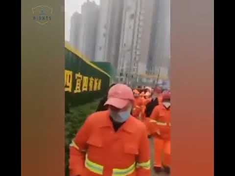 Bazhong City CCP China, sanitation workers marched to the government to demand 8 months' pay.