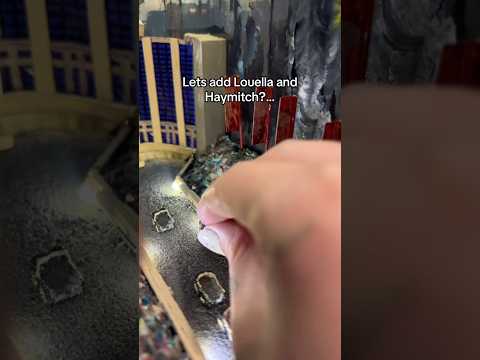 Adding Louella and Haymitch into the Hunger Games book nook of the tribute parade 😅