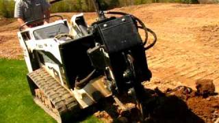 preview picture of video 'Bobcat MT55 installing irrigation line'