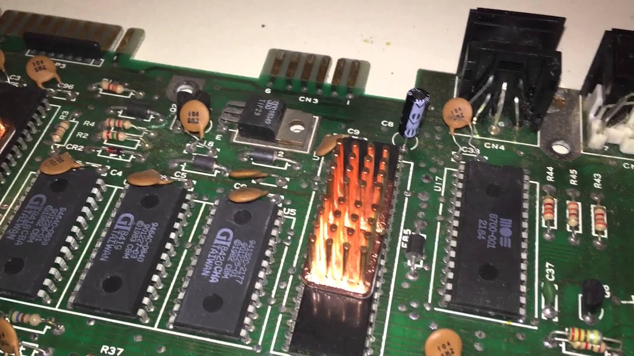 Commodore 64 Repair - Electrolytic capacitor Recap and test