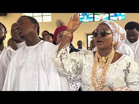 MERCY AIGBE AND SIBLINGS IN CHURCH FOR THEIR MOTHER’S BURIAL SERVICE 