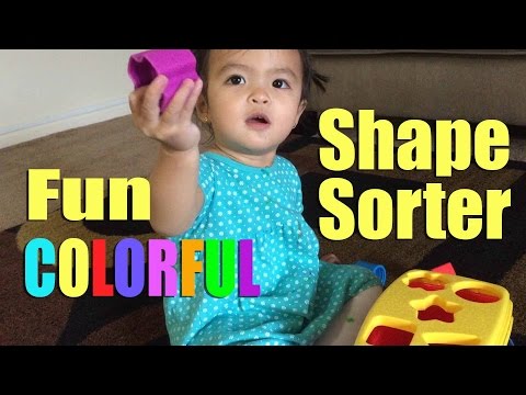 Playing with shape sorter | Learning Shapes Video for toddler - YouTube