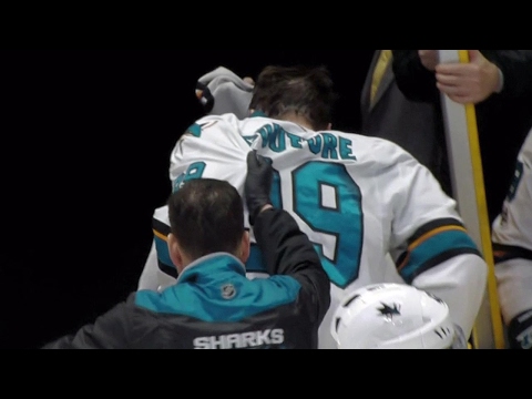 Couture exits after taking deflected Burns shot to face