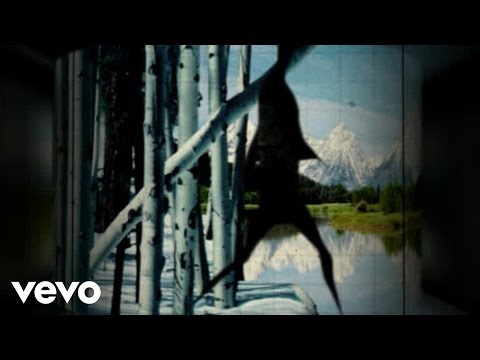 Videoclip de Du Nord au Sud (Album Version) — Louise Attaque