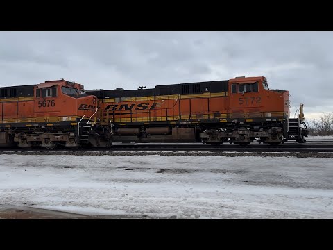 BNSF #5772 lead this empty Becker MN coal passing the new crew of the Manifest. Staples Sub