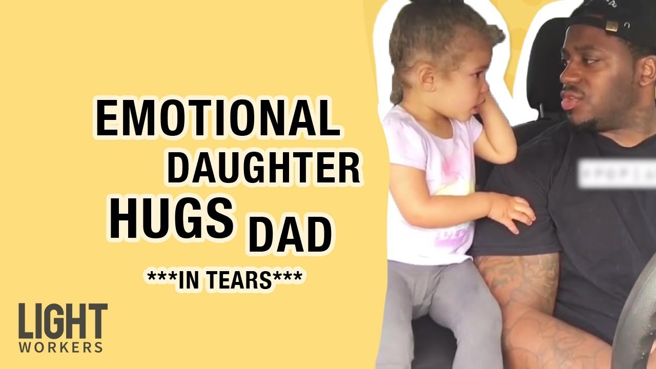Father Comforts His Daughter with a Hug