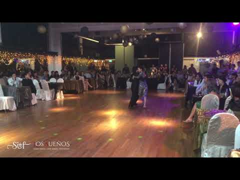  Leonel Hung-Yut Chen  and  Hwayi Florencia  are  dancing  to  the  tango  "  Corazon  "  by  Carlos di Sarli  at  Singapore International Tango Festival  in  2018
