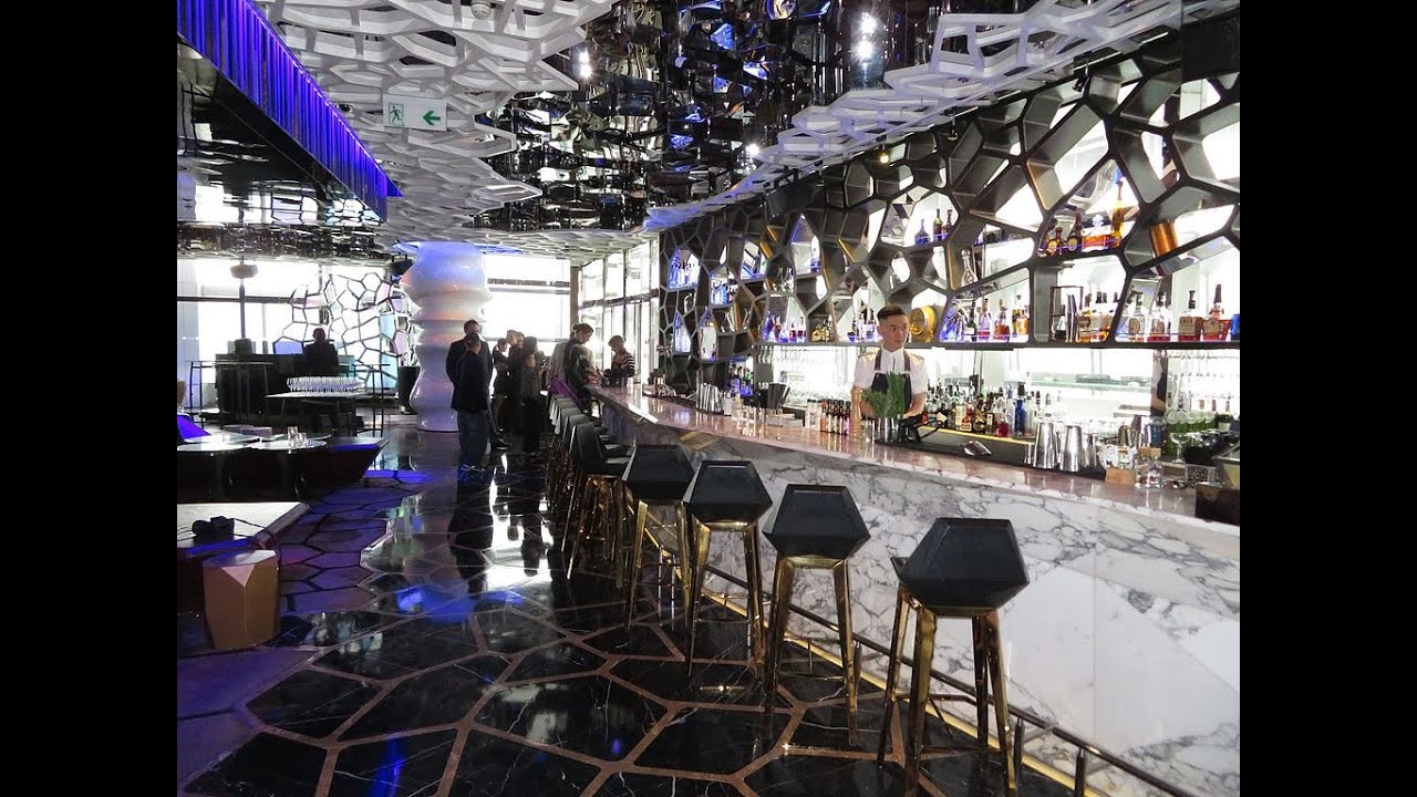 Dance to live DJs and indulge in signature cocktails crafted with creative twists in Ozone Bar