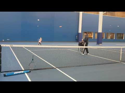 7 year old Charlotte hitting forehands down the line