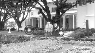 President and Mrs. Dwight D. Eisenhower, with their grandchildren, at their farm ...HD Stock Footage