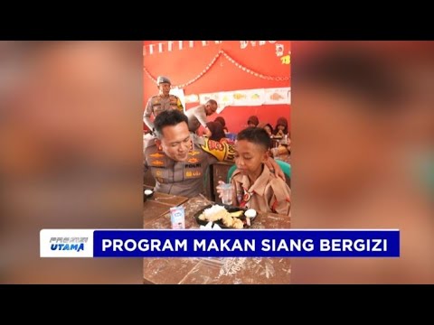 POLRES BANYUASIN BAGIKAN MAKAN SIANG DI SDN 13 AIR KUMBANG