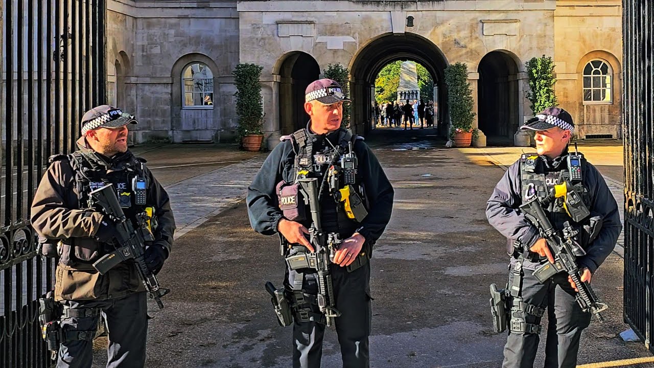 POLICE DREAM TEAM ON DUTY ON A DAY WITH REMARKABLE LIGHT AND SHADOWS at Horse Guards