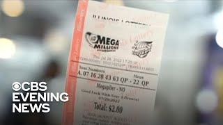 Americans race to buy Mega Millions lottery tickets for $1.28 billion jackpot