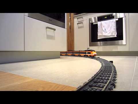 LEGO 10233 Horizon Express train at high speed on long curve layout