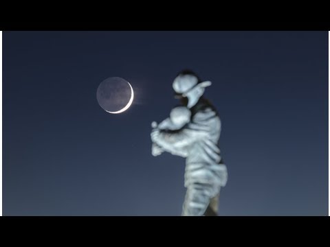 Striking night-sky photo of 'baby' moon honors firefighters
