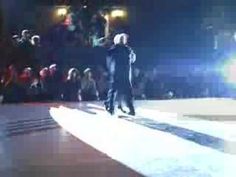  Elba Garcia  and  Nito Garcia  are  dancing  to  a  tango