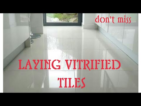 Laying vitrified tiles on floor