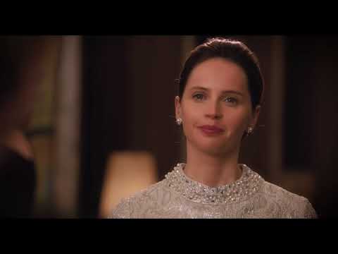On the Basis of Sex official trailer still — Felicity Jones as Ruth Bader Ginsburg walking past the Supreme Court