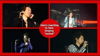 Harry Styles reacting to fans singing tasted