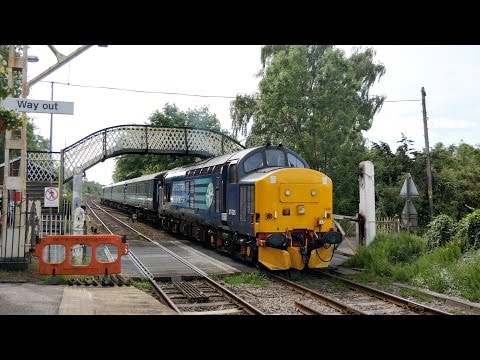DRS 37425 & 37405 erupt out of Brundall - 2P13
