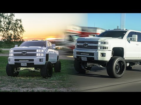 2015 CHEVY HIGH COUNTRY WITH CUSTOM ANGEL EYE HEAD LIGHTS ON 24X14 AFW WITH A 9 INCH LIFT!