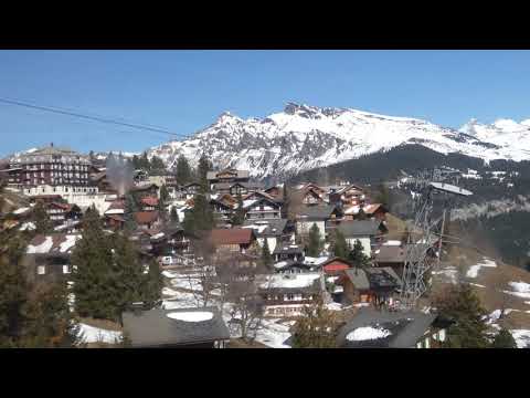 4K. MÜRREN - GIMMELWALD - STECHELBERG cable car near Lauterbrunnen. SWITZERLAND Swiss Alps Jungfrau