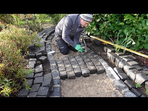 Gartenweg pflastern mit Naturstein