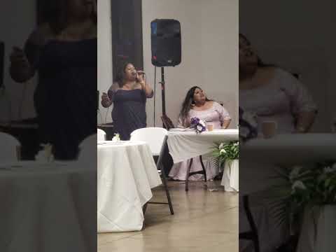 Ciera Faitau singing for the couple