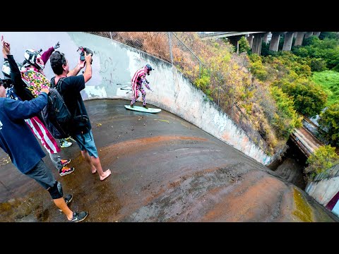 Guys Surf Down A Dangerously Steep Storm Drain, Wipe Out Hard