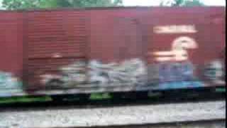 preview picture of video '2 Long CSX Freight Meet at High and Moderate Speeds'