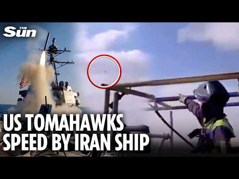 Moment US Tomahawk missiles speed just above cargo ship heading towards Iran