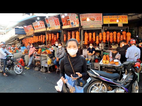 Many Roasted Whole Pigs at Orussey Market in Phnom Penh, Cambodian Street Food Tour 2022