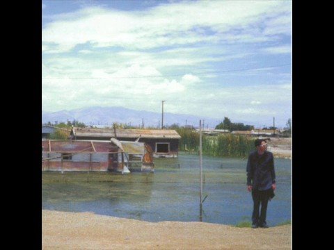 Boy at a Bus Stop - The Bicycle Thief