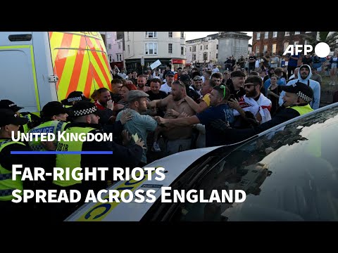 Far-right rioters clash with police during protests across UK cities | AFP
