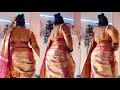 Back Pose In Cream Pink Banarasi Saree With Designer Backless Blouse Traditional Elegant Look