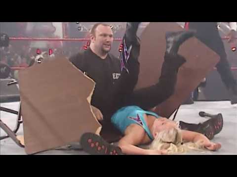 Dudley Boyz putting women through tables