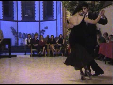  Maria Ines Bogado  and  Sebastian Jimenez  are  dancing  to  the  vals  "  Flor de Lino  "