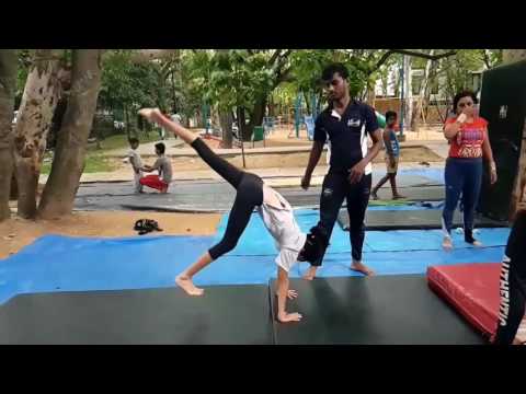 RHEA AND CHAITANYA PRACTICE GYMNASTICS IN GUARDIANS OF PARADISE SCHOOL OF MARTIAL ARTS AND GYMNASTIC