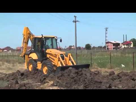 Обзор экскаватора-погрузчика Komatsu WB93S-5