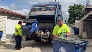 Garbage recycling - interestingly collecting trash bins from big garbage truck