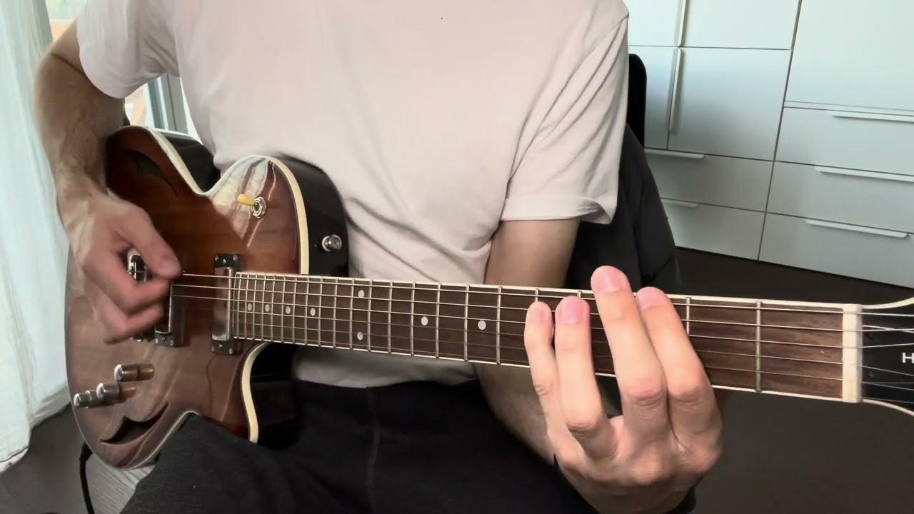 Roberto Barlocci playing the main riff of The Beatles' Lady Madonna on guitar.